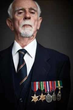 Studio Portrait Of Senior man Wearing Medals Stock Photos