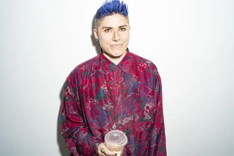 Studio portrait of smiling non-binary person Stock Photos