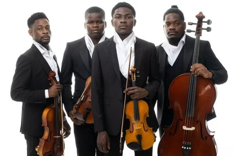 Studio portrait of a string quartet on a white background. African americans Stock Photos