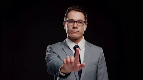 Studio portrait of successful and smart businessman in suit and tie. Man in Stock Footage 148993871