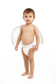 Studio Portrait Of Toddler Wearing Nappy And Angel Wings Stock Photos