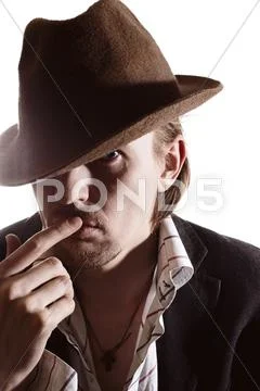 Studio portrait of a young man in a hat Stock Photos