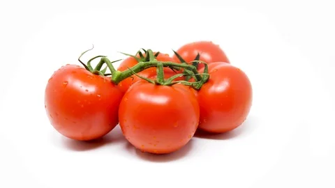 Studio: Red tomatoes 360 degree spin, isolated Stock Footage 90659807