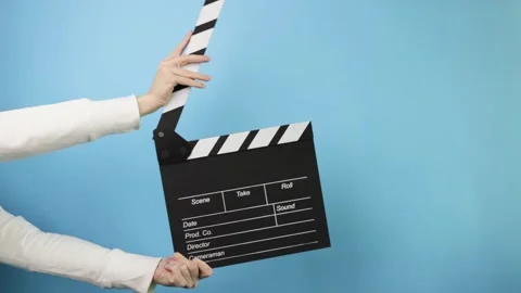 Studio scene setup, clapping the slate, marking a film take during shooting Stock Footage 308702397