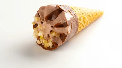 Studio shoot of mini size chocolate flaovr ice cream cone melting and reverse Stock Footage 91603552