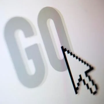 Studio shot of arrow cursor on go button Stock Photos