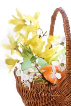 Studio shot of basket with easter eggs Stock Photos