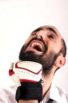 Studio shot of a beard man hit from by punches Stock Photos