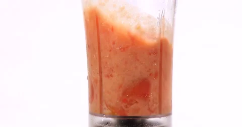 Studio shot of Blending tomatoes in blender Stock Footage 162588271