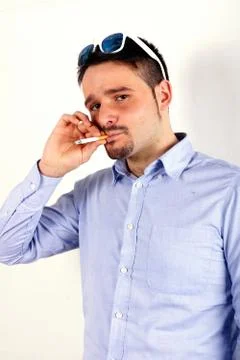 Studio shot of a boy with cigarette Stock Photos