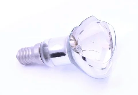 Studio shot of broken incandescent light bulb isolated on white background Stock Photos