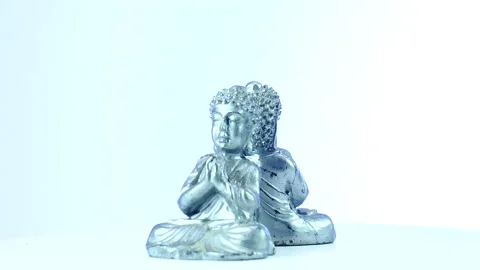 Studio shot of Buddha figurines rotating Video stock 170877923