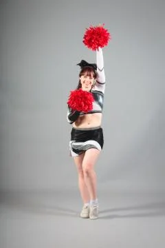 Studio Shot of Cheerleader Posing 写真素材