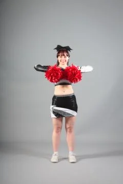 Studio Shot of Cheerleader Posing Фото