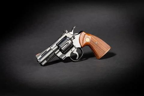 Studio shot of a Colt Python 3 revolver pistol short weapon on black backgr.. 写真素材