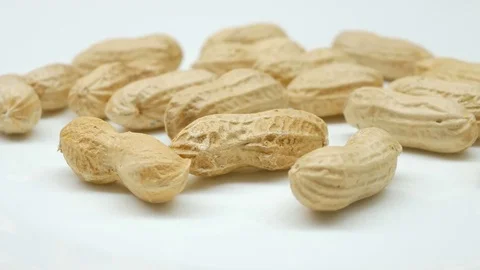 Studio shot footage of peanuts rotates in right side, Close-up Stock Footage 82633779