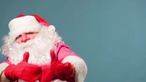 Studio shot front view cheerful Santa Claus half body dances, gesticulating Stock Footage 211684054