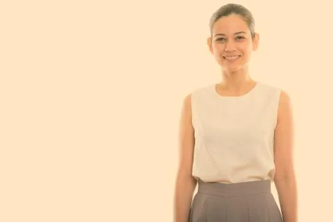 Studio shot of happy young beautiful woman smiling Foto stock
