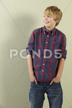 Studio Shot Of Happy Young Boy Stock Photos