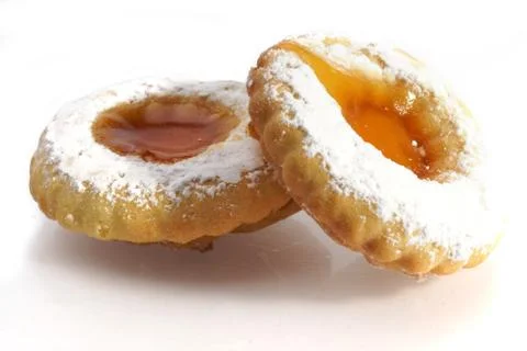 Studio shot of jam filled biscuits on white background Stock Photos