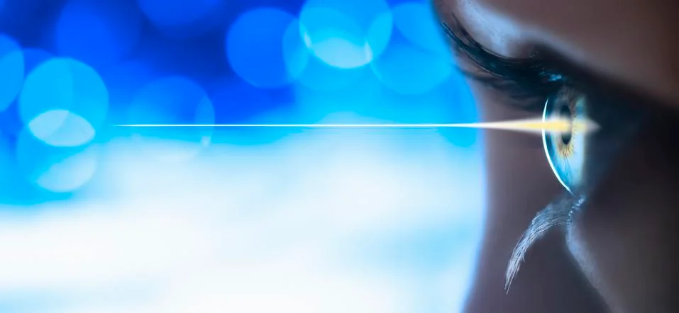 Studio shot of light beam coming from eye Stock Photos
