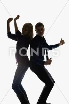 Studio shot of a man and a woman dancing Stock Photos