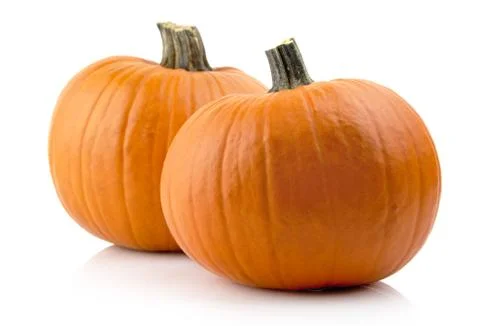 Studio shot of orange pumpkins isolated on white background Stock Photos