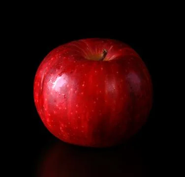 Studio shot of a red apple on black background Stock Photos