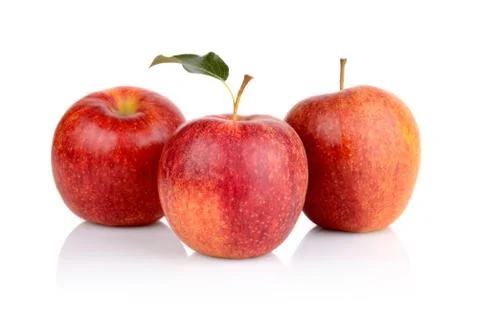 Studio shot of red apples with leaf isolated on white background Stock Photos