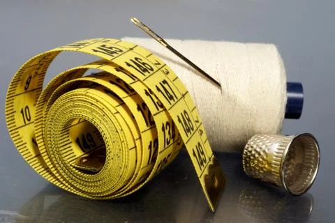 Studio shot of a sewing kit on black bakground Stock Photos