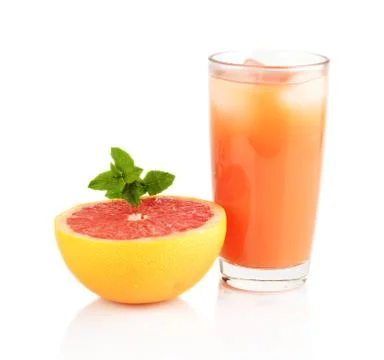 Studio shot of sliced grapefruit with grapefruit juice with ice cubes and min Stock Photos