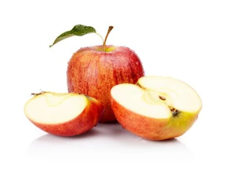 Studio shot of sliced red apple with leaf and water drops isolated on a white Stock Photos