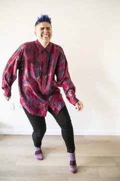 Studio shot of smiling non-binary person Stock Photos