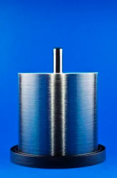 Studio shot of stack of CDs on spindle Foto stock