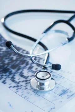 Studio shot of stethoscope with dna test Foto stock