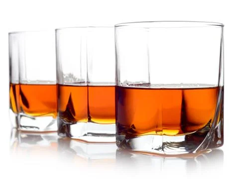 Studio shot of three glasses of whiskey Stock-Fotos