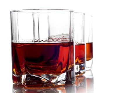 Studio shot of three glasses of whiskey Stock Photos