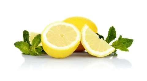Studio shot of three sliced lemons with mint isolated on a white background Stock Photos