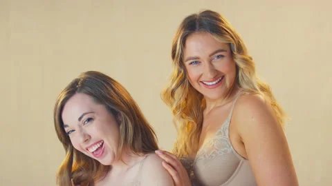 Body positive, friends and woman in underwear in studio for