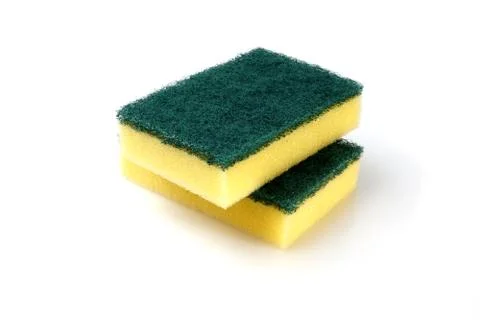 Studio shot of two yellow and green sponges Stock Photos