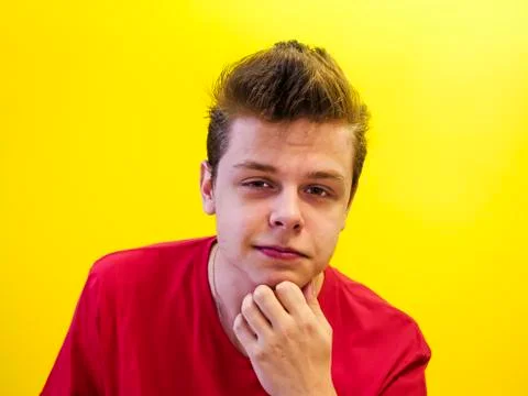 Studio shot of a young handsome guy on a colored background Stock-Fotos