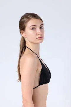 Studio Side Profile Model Looking Directly at Camera Stock Photos