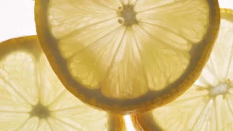 Studio Slider Shot of Whole Lemon on Black Background 4K Stock Footage 325981280
