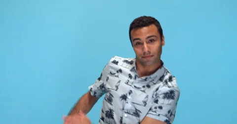 Studio, slow motion, happy young man showing off dance moves Stock Footage 115515656