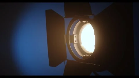 Studio spotlight against a blue gradient background Stock Footage 326198846