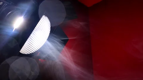 Studio Stage Light with Dramatic Haze on Red Background Stock Footage 288736807