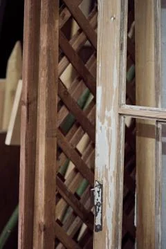 Studio with wooden door frames in different shapes and sizes Stock Photos