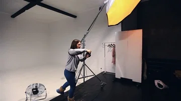 Studio working process photographer making photos with beauty model Video stock 85480158