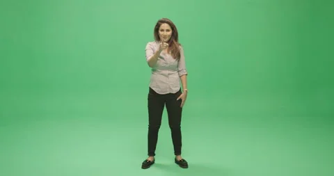 Studio, young lecturer silences a member of the audience, London, UK Stock Footage 139869784