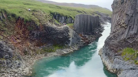 Studlagil canyon with hexagonal basalt columns and turquoise water, hidden gem Stock Footage 138739766
